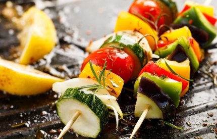 Image of veggie kebabs being cooked on BBQ